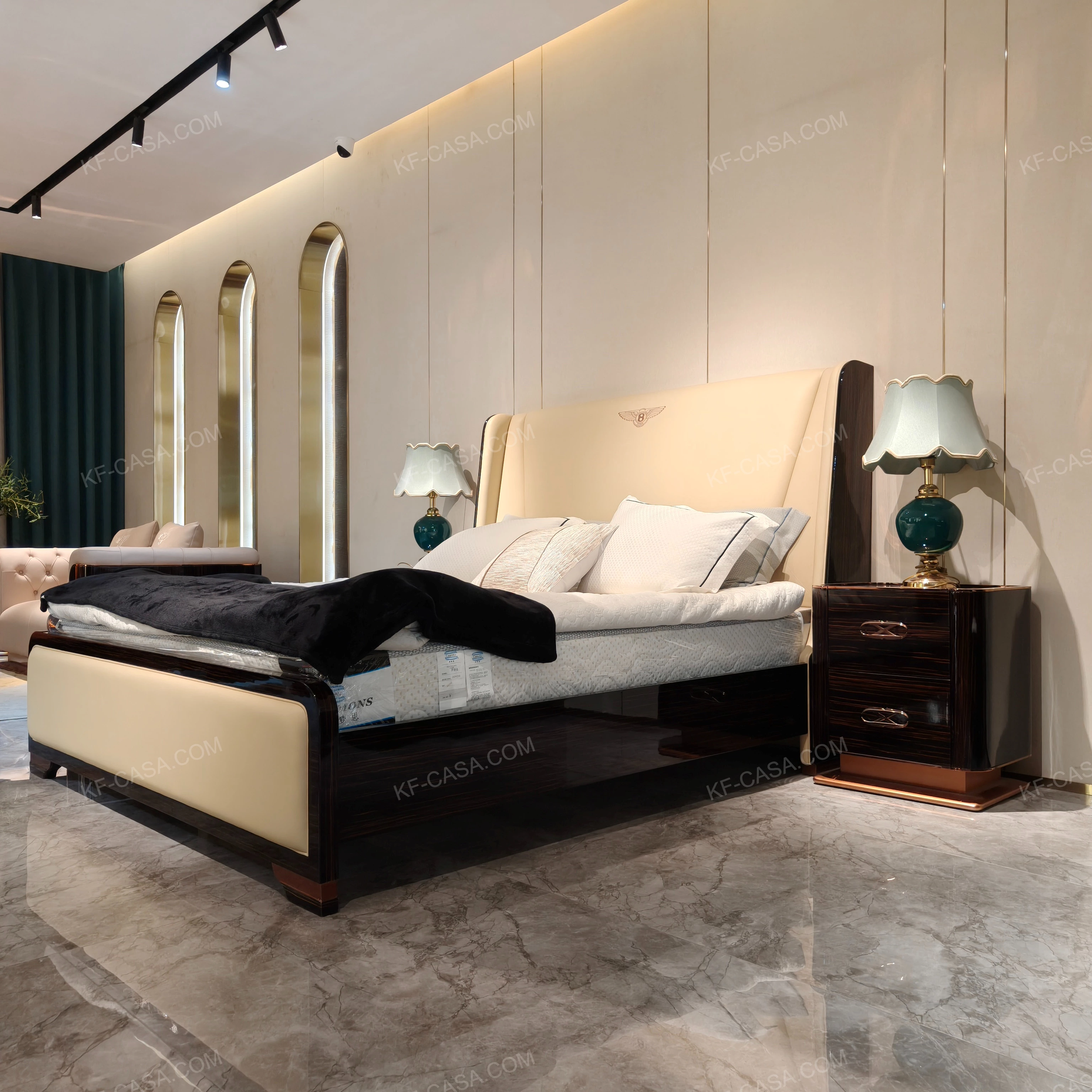 Cream Leather Upholstered Bed with Dark Natural Wood Veneer Trim, Embossed Brand Emblem & Copper-Accented Hardware